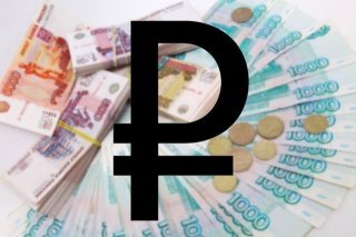 Россия: долларнинг курси 70 рублдан ошди фото