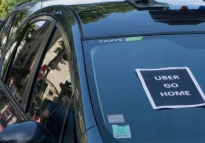 Францияда Uber такси хизматининг икки раҳбари ҳибсга олинди фото