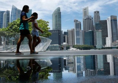 Сингапур бюджетидан ортган 700 миллион доллар аҳолига тарқатилади фото