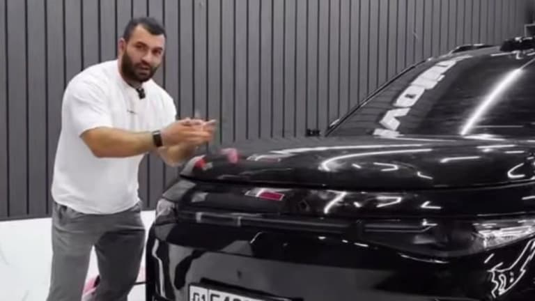 Blogger Who “Kept Fish” on Car Hood Fined