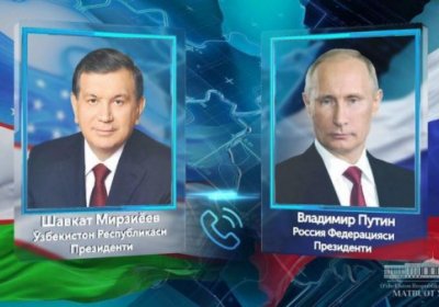 Mirziyoyev va Putin telefon orqali muloqot qildi фото