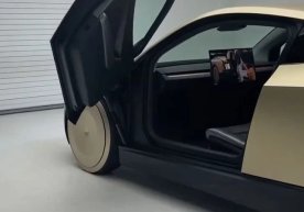 Tesla компанияси рулсиз электромобилни оммага тақдим этди фото