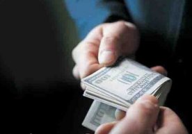 Олий ўқув юрти кафедра мудири 1000 доллар билан қўлга тушди фото