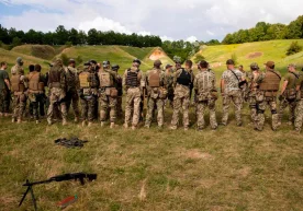Фото: EFE Украиналик ҳарбийлар «Дронлар армияси» ва