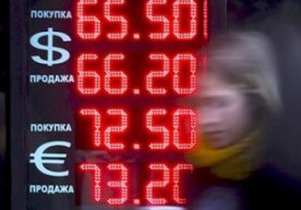 Moskva birjasida dollar kursi 65 rubldan oshdi фото