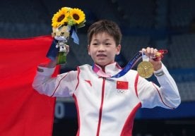 Xitoylik 14 yoshli Olimpiada chempionining oilasi 30 mln funt sterling miqdoridagi mukofotdan voz kechdi фото