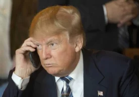 Трамп учта давлат етакчиси билан суҳбатлашди фото