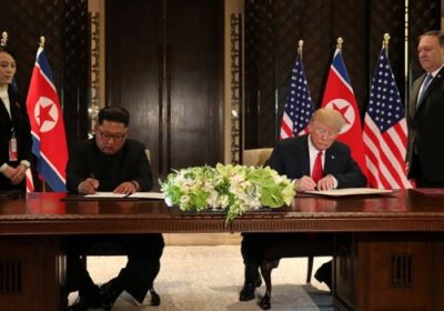 Трамп ва Ким Чен Ин якуний ҳужжатни имзолади фото