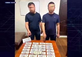 Фото: Видеодан кадр Давлат хавфсизлик хизмати фуқароларни