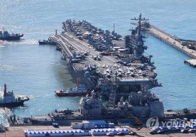 USS Ronald Reygan авиаташувчи кемаси Пусан ​​портида Фото: