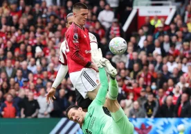 The match between Manchester United and Liverpool at Old