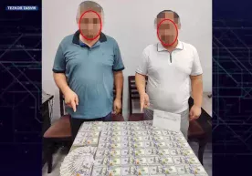 Тошкент ва Фарғонада адвокатлар 50 минг доллар билан ушланди фото