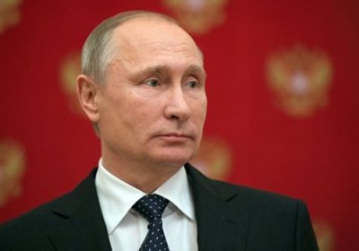 Putin davlatga xiyonatda ayblanib qamalgan ayolni afv etdi фото