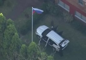 Сидней шаҳрида Россиянинг бош консуллиги дарвозасига