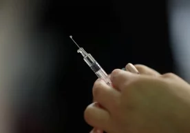 Фото: Reuters Хитой ҳарбийларнинг CanSino Biologics ва