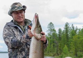 Putinning Sibirga safari: Baliq ovi va Baykalning ekologik holati haqida (Video) фото