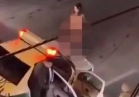 Фото: Видеодан кадр Эронда аёл “кийиниш қоидаларига қарши