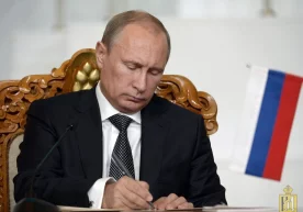 Путин Украинада ўлганларнинг оилаларига пул тўлашга оид фармонни имзолади фото