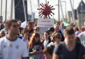 Берлинда карантинга қарши норозилик намойиши ўтказилди фото