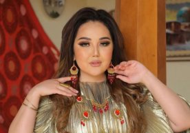 Хонанда Умидахон Ҳожиевадан журналист томонидан “Сизни