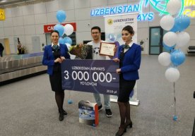 Uzbekistan Airways юбилей йўловчисини кутиб олди фото