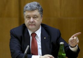 Порошенко Путин билан баҳслашган элчини ишдан бўшатди фото