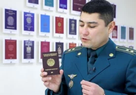 Фото: Kun.uz Хорижга чиқиш паспорти ва стикер биргаликда