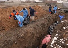 Mariupol yaqinida 200 metr uzunlikdagi ommaviy qabr topildi фото