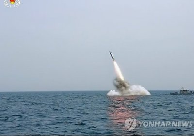 КХДР учирган баллистик ракета Япон денгизига қулади фото