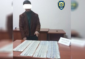 Andijonda tergov jarayonini ijobiy hal etish uchun 8 ming dollar olgan shaxs ushlandi фото