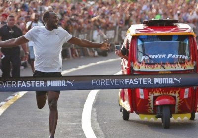 Useyn Bolt mototaksi bilan bahslashdi фото