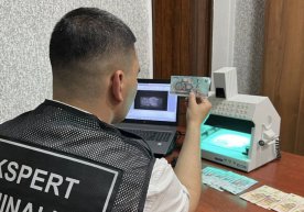 Тошкентда харидор қалбаки пулга iPhone сотиб олгани аниқланди фото