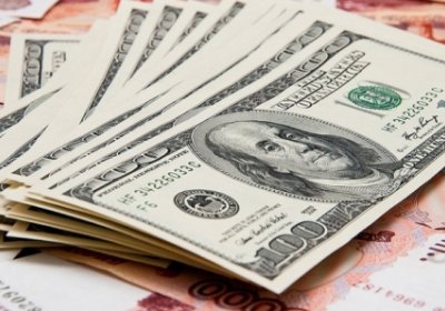 Rossiyada dollar kursi 59 rubldan pasaydi фото