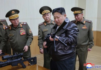 Ким Чен Ин янги снайпер милтиғини синовдан ўтказди (фото) фото