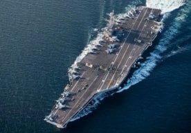 US nuclear aircraft carrier collides with merchant ship фото