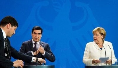 Turkmaniston prezidenti yordamchisining harakati Angela Merkelni hayratga soldi (Foto va video) фото