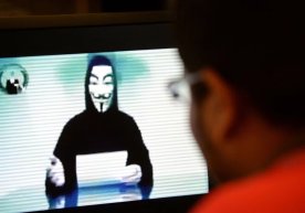 Фото: AFP Anonymous хакерлик гуруҳи Россия ҳукуматига