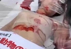Фото: Видеодан кадр Япониядаги «Гўшт фестивали»да бир