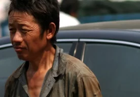 Yong‘oq terishga chiqqan xitoylik Hu familiyali kishi