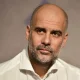 The team Manchester City, led by Josep Guardiola, after a