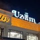 Ресторанлардан бири “Uzum” кўринишидаги белгини умумий