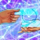 The volume of monthly payments made via crypto-linked