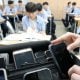 Жанубий Корея парламенти мактабларда дарс вақтида мобил