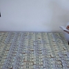 AQSH dollarlarini yurtimizdan yashirincha olib chiqilishi fosh etildi