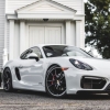Видео: Tesla ва Porsche пойгаси - қай бири ғолиб?
