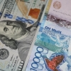 Қозоғистонда доллар курси янги тарихий рекорд қайд қилиб, 300 тангадан ошди