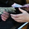 Валютани ноқонуний равишда олиш ёки ўтказганлик учун жарималар оширилди