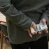 Тайлоқ туман ИИБ инспектори 60 минг доллар пора билан қўлга тушди