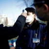 Хитойда коронавирусдан бир кунда 65 киши вафот этди