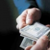 Олий ўқув юрти кафедра мудири 1000 доллар билан қўлга тушди